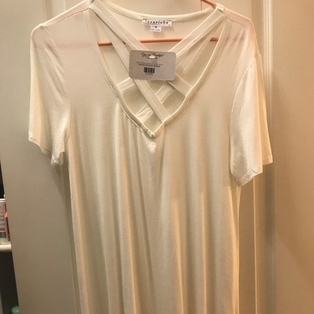 Off white shirt with caged detail